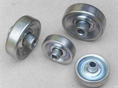 Iron and plastic pressed bearings