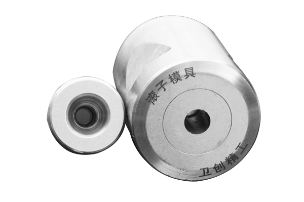 WBM produces taper roller dies with high efficiency and automation. Rollers are formed on a single automatic cold heading press and are fed |  cut |  and punched into the die for five steps.
